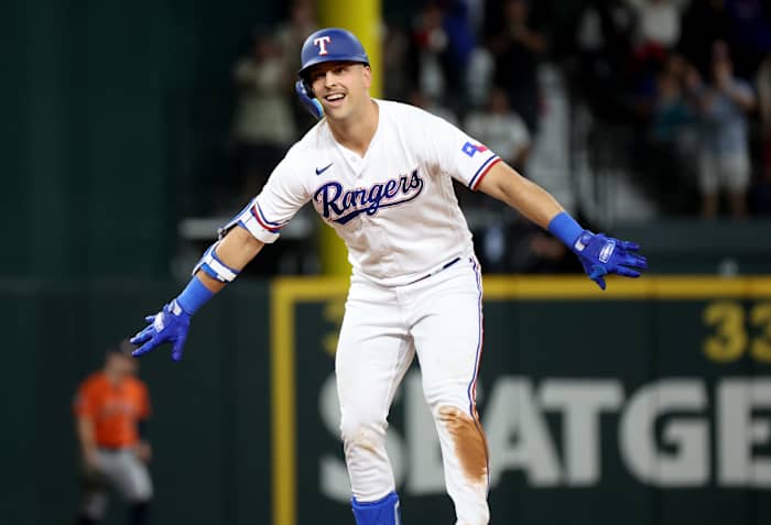 Texas Rangers first baseman Nathaniel Lowe reacts after a double during the second inning in Game 4 of the ALCS against the Houston Astros on Oct. 19.